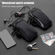 Carregar imagem no visualizador da galeria, Universal 6.7'' Phone Armband Outdoor Waterproof Fitness Running Sport Arm Cellphone Holder With Headphone Jack Mobile Phone Bag
